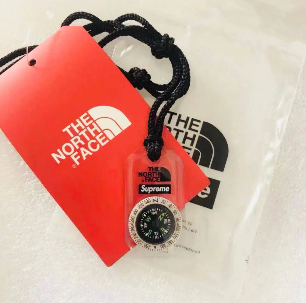 Supreme x The North Face Compass Necklace Clear FW18 (NF0A3SEDJK3) One Size